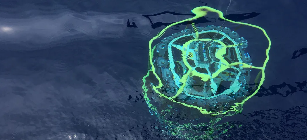 A CTD (conductivity, depth and temperature) rosette is lowered into the North Atlantic Ocean on a research cruise. CTD